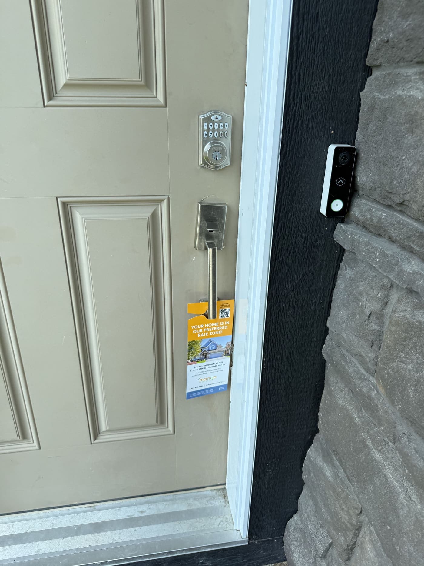 A door hanger StreetDrop delivered, hanging on a Calgary front door handle