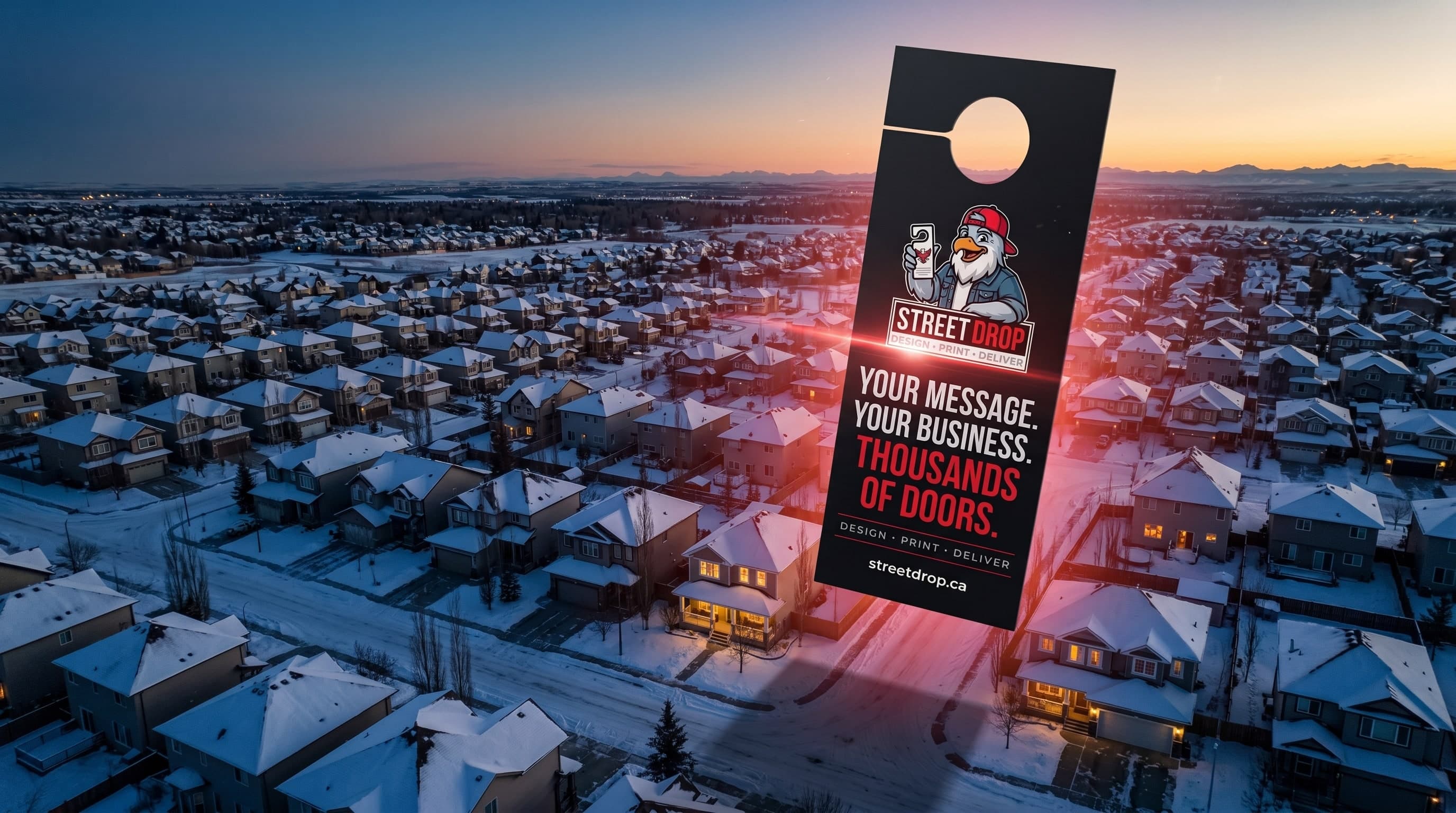 Editorial aerial composite of an oversized red-and-black StreetDrop door hanger looming over a Calgary suburban neighborhood at magic hour